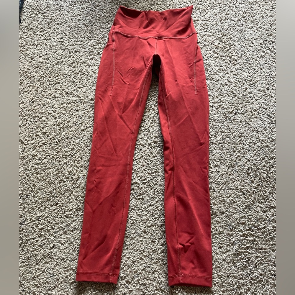 wunder train 25” inseam size 4 hr
